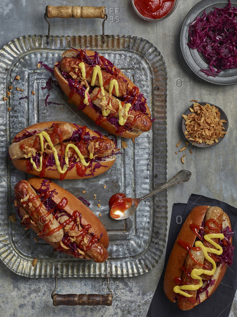 Winter hotdogs with spiced red cabbage, cripy onions, ketchup and mustard