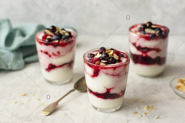 Yogurt with honey, berries and almond flakes
