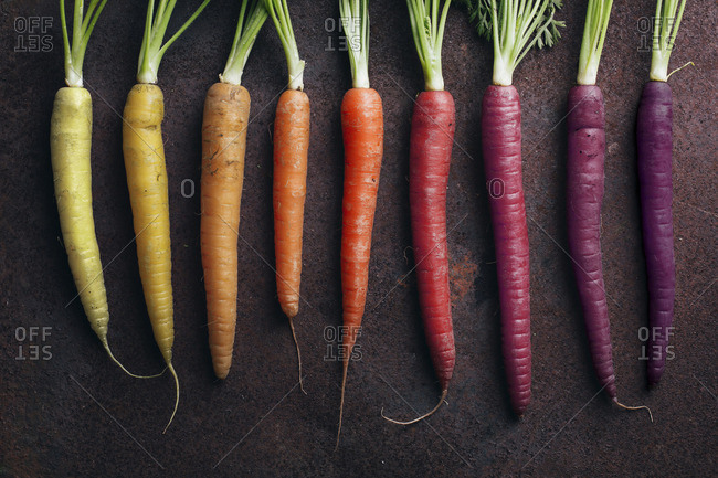 Colorful yellow, orange and purple carrots