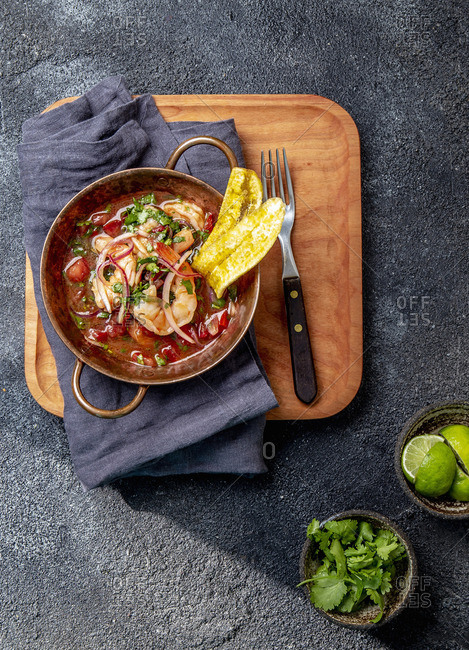 Prawn and tomato stew with plantain chips