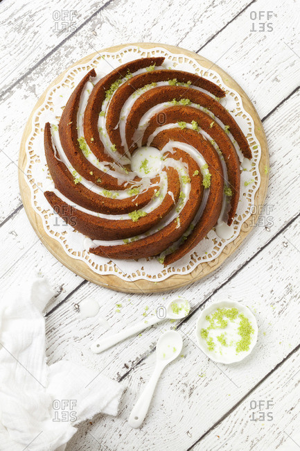 Overhead Courgette Lime Bundt Cake with Drizzled Icing Lime Zest
