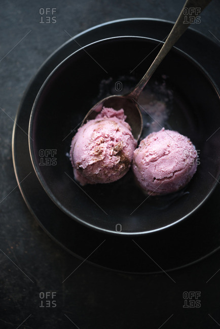 Vegan strawberry ice cream with a chocolate ripple