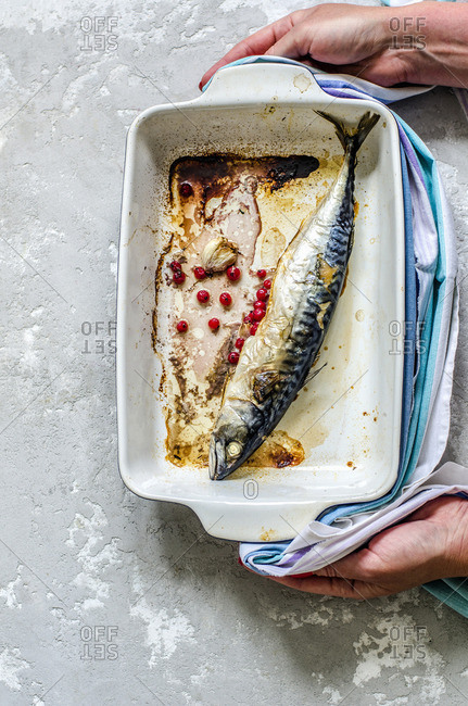 Fried mackerel in a baking dish
