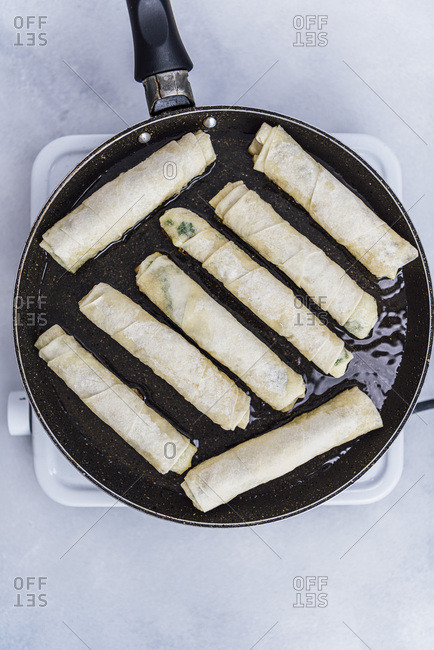 Turkish sigara borek frying in a pan