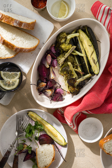 Overhead view of vegetarian dinner with baked vegetables