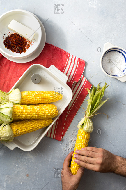 Overhead view of preparing sweet corn