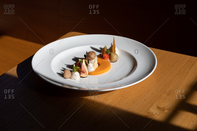 A gourmet dish with figs and chestnuts