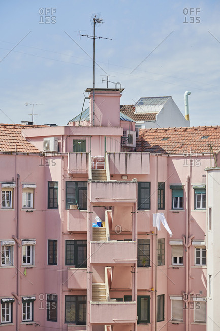 Pink apartment building in Lisbon, Portugal