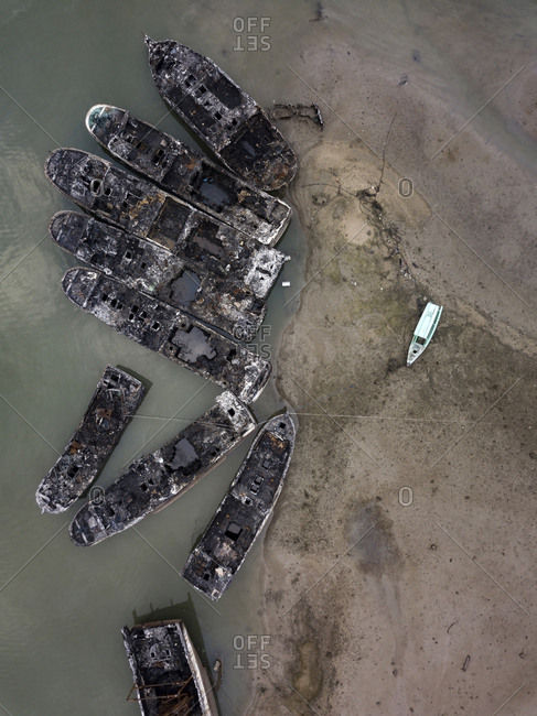 Abandoned boats at beach