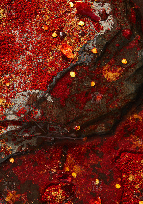 Pepper and seasoning on dark background