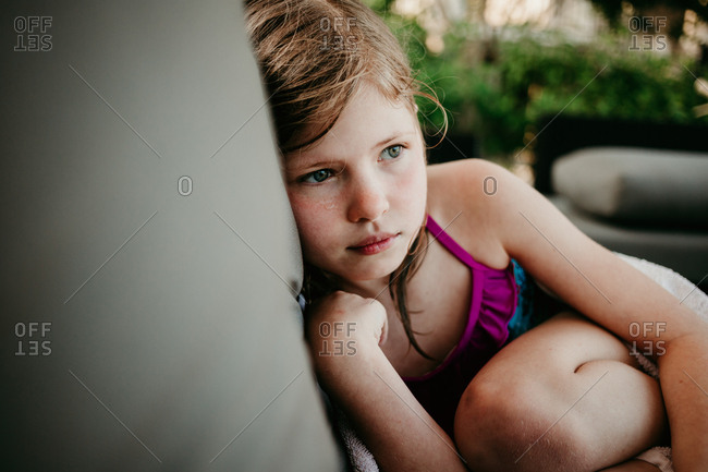 Little girl relaxing after a swim