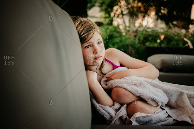 Young girl relaxing after a swim