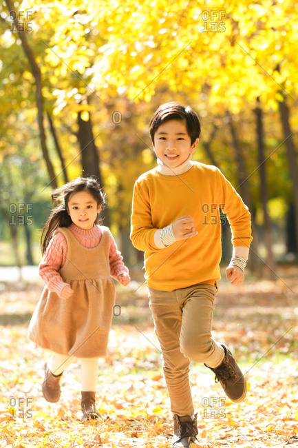 Happy children run in the open air