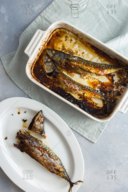 From above baked mackerel in a baking dish