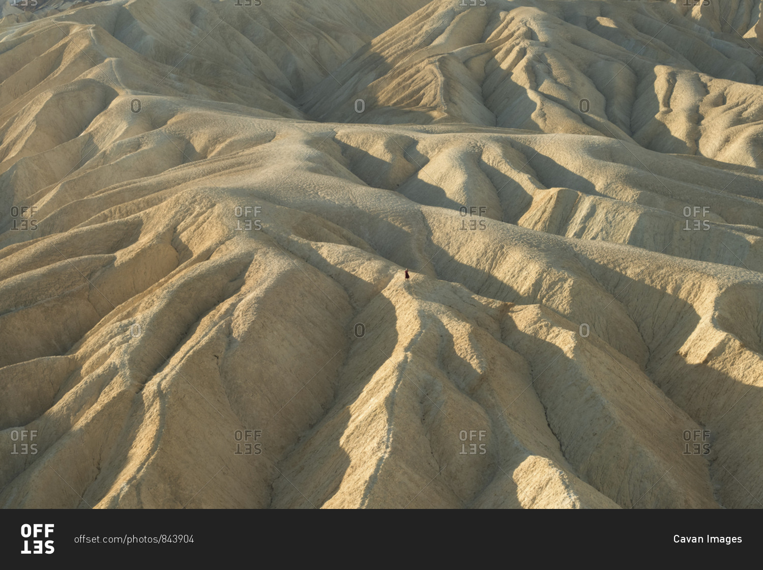 Distant view of woman at Zabriskie Point in Death Valley National Park