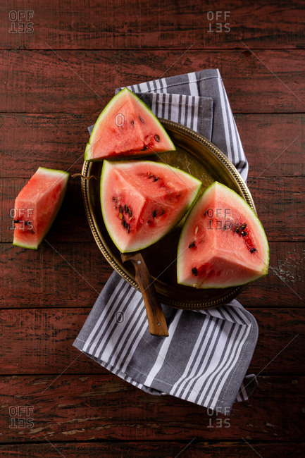 Fresh and ripe watermelon on rustic background
