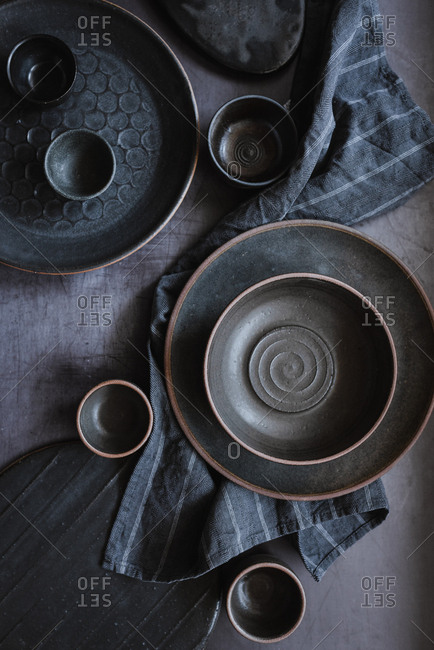Dark gray ceramic plates and bowls