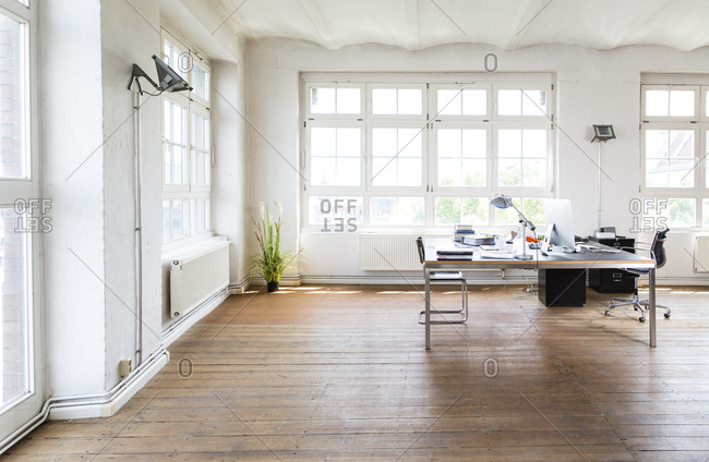 Desk and chair in bright office