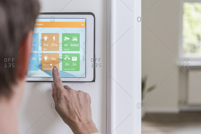 Woman using smart home screen