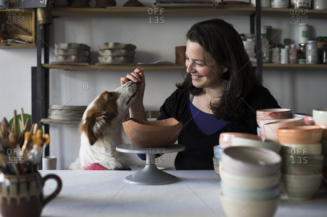 Potter giving dog a treat