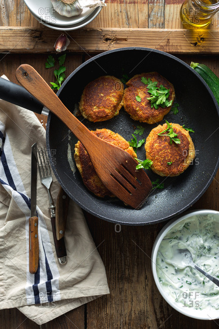 Vegetable cutlets in a pan with vegetarian sauce