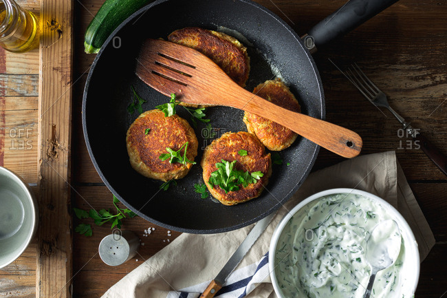 Vegetable cutlets in a pan with vegetarian sauce