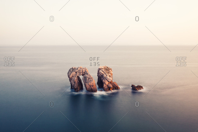 Rock formation at the ocean. Playa de la Arnia, Cantabria, Spain