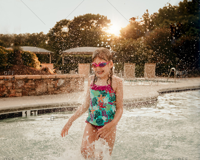 Girl having fun in a pool