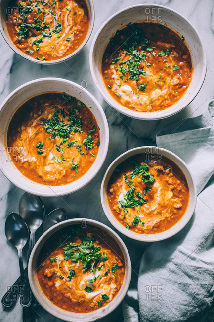 Tomato lentil soup with herbs.