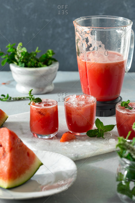 Making summer watermelon mojitos