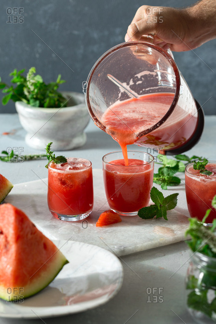Pouring summer watermelon cocktails