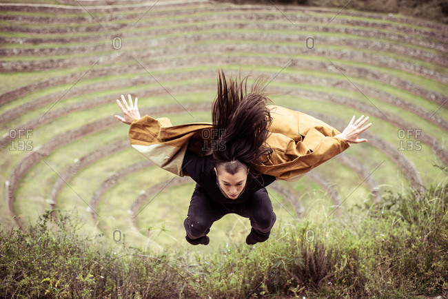 Epic jump in center of circle of stones- ancient Inca ruins