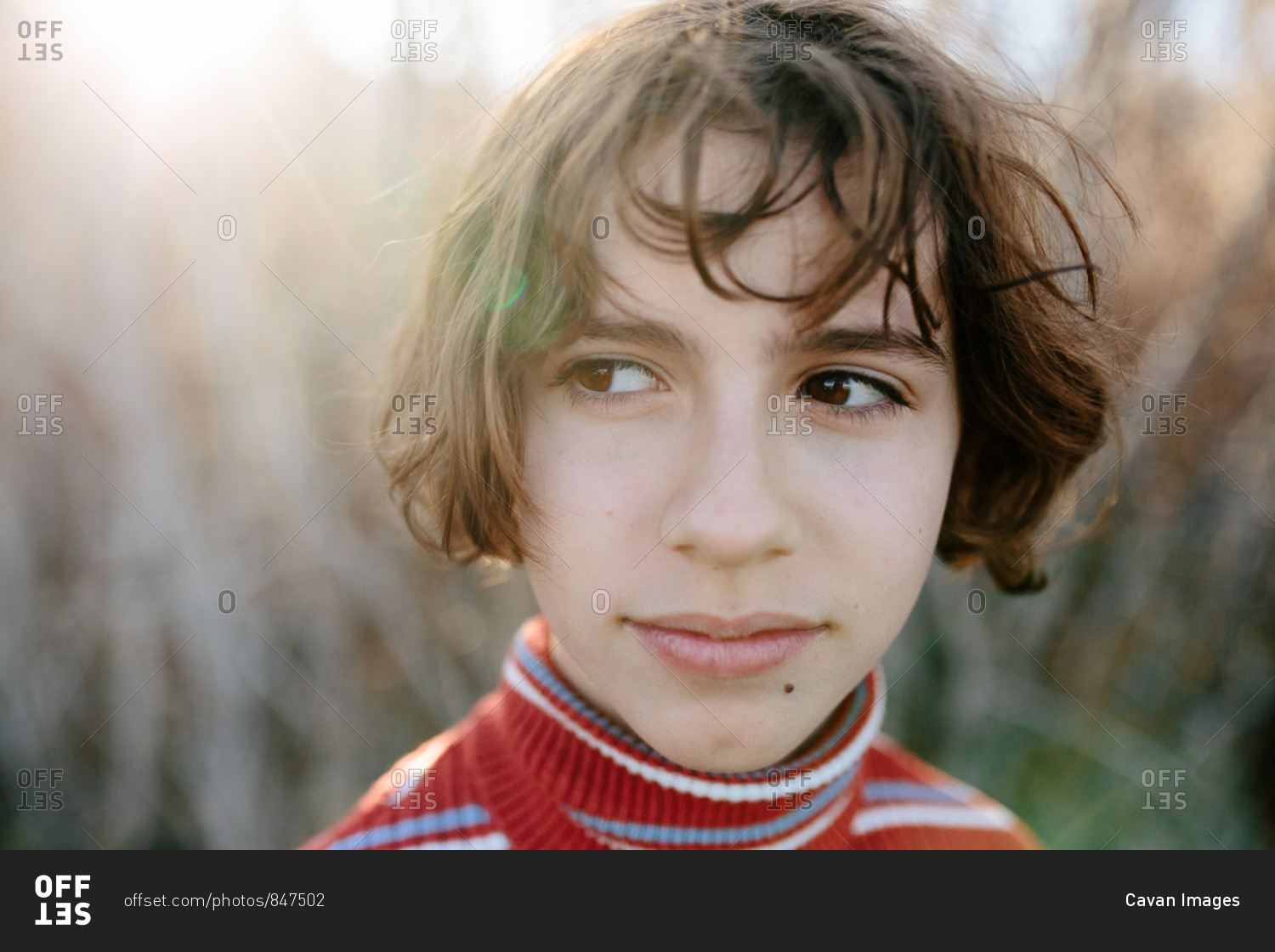 Closeup portrait of a young teen girl with a sideways glance