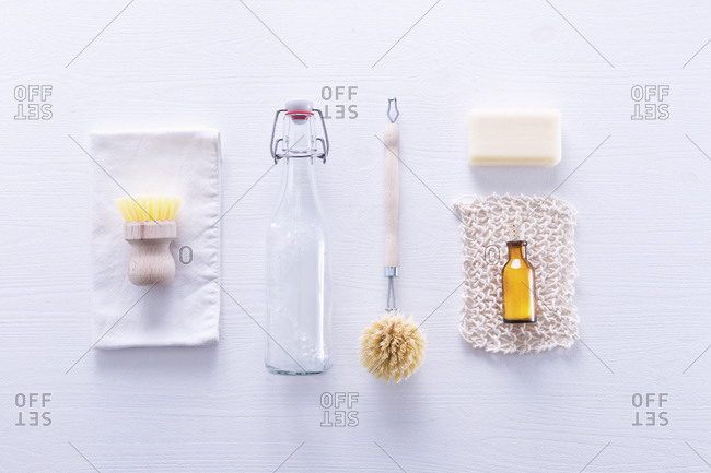 Ecologically friendly brushes, cleaning rags, soap and baking soda