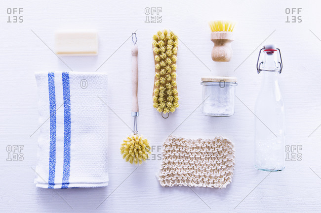 Ecologically friendly brushes, cleaning rags, soap and baking soda