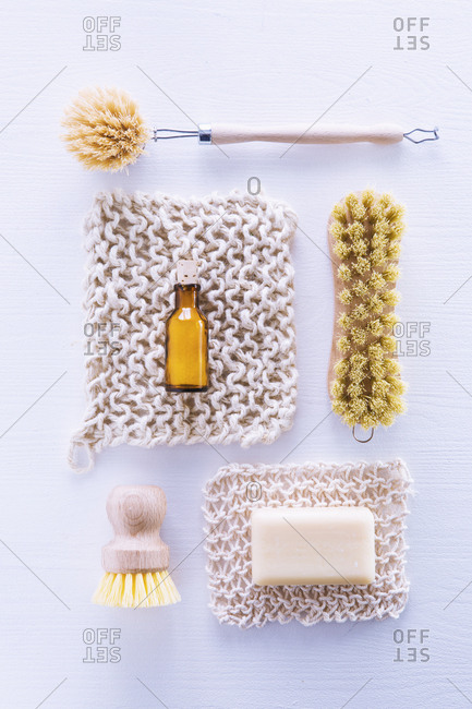 Ecologically friendly brushes, cleaning rags, soap and baking soda