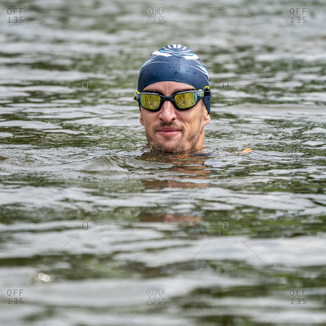 Young triathlete in a lake