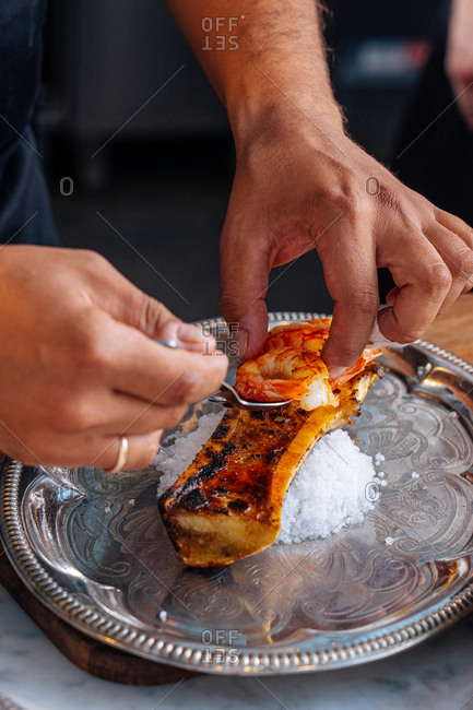 Chef preparing a shrimp dish