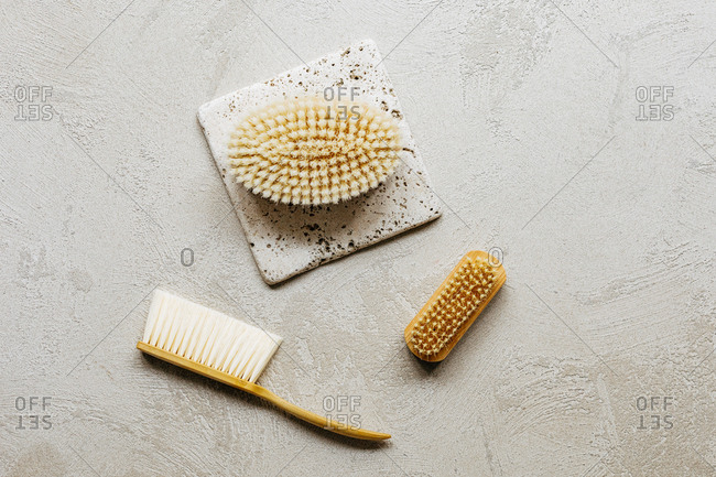 From above photo of composition with wooden bathing brushes.