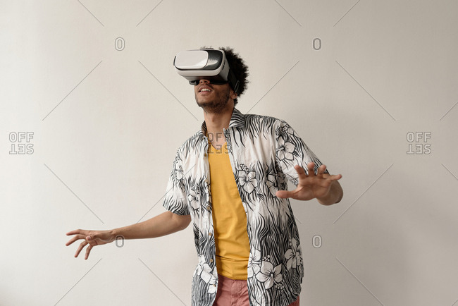 African American student playing games using VR headset