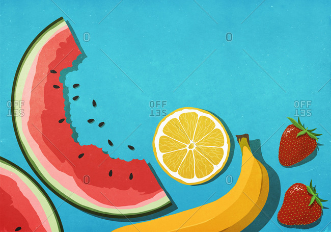 Fresh, juicy fruits on blue background
