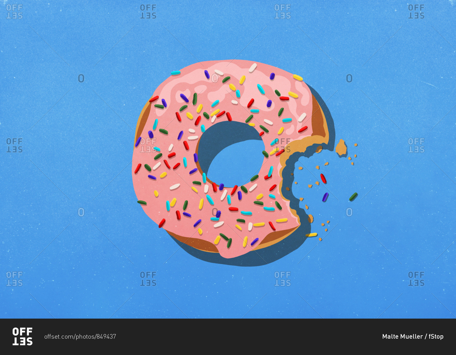 Missing bite from donut with sprinkles