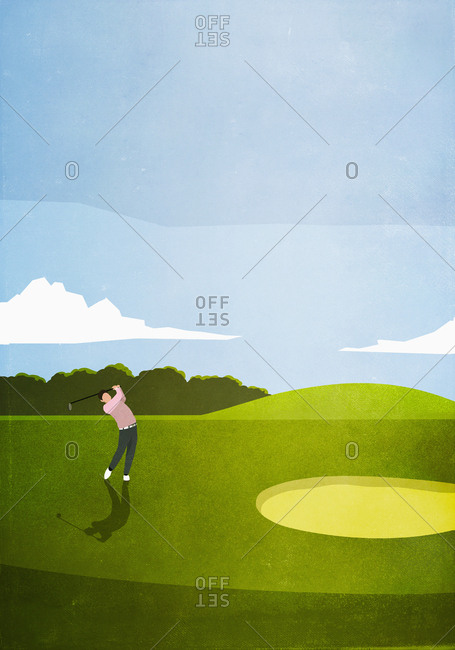 Man golfing on sunny golf course