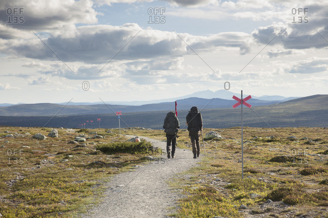 Hikers in field