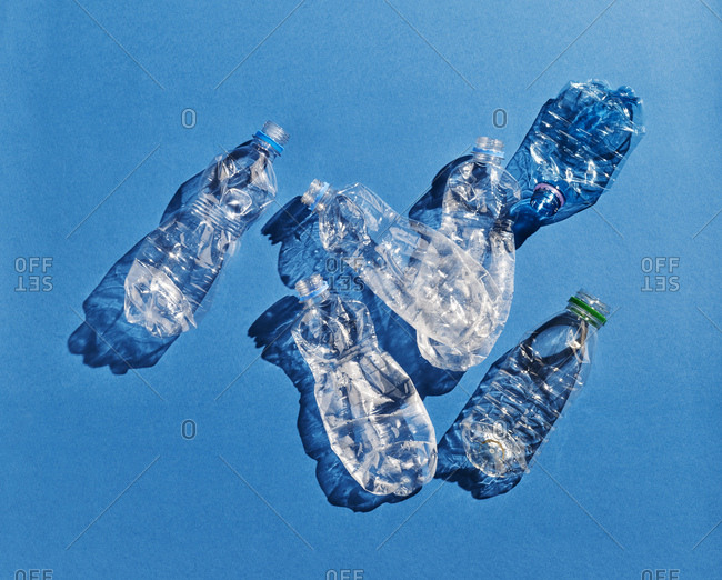 Plastic bottles on blue background