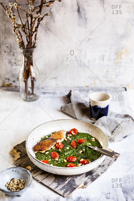 High angle view of fresh meal in bowl served on white table