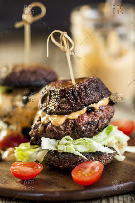 Close-up of fresh burger on served on table