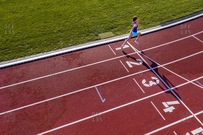 Runner crossing the finish line stock photo