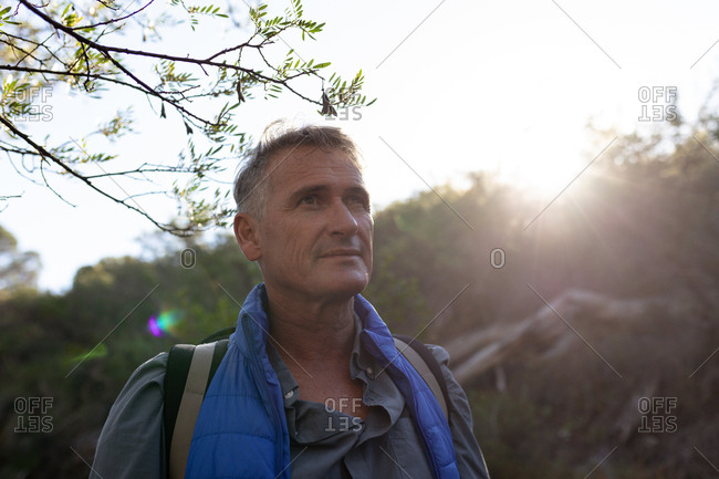 Middle aged man enjoying time outside in nature