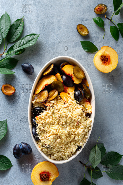 Overhead view raw ingredients for cooking plum peach pie